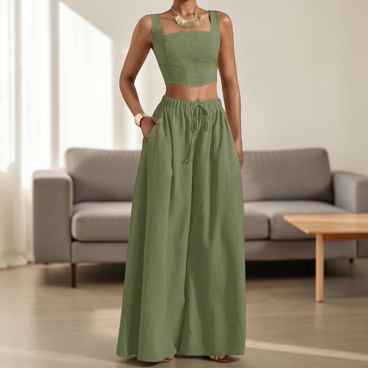 Conjunto de dos piezas sin mangas: pantalón de pierna ancha y top corto.