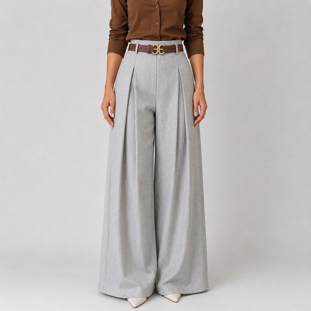 Pantalones de talle alto y pierna ancha con cintura elástica plisada.