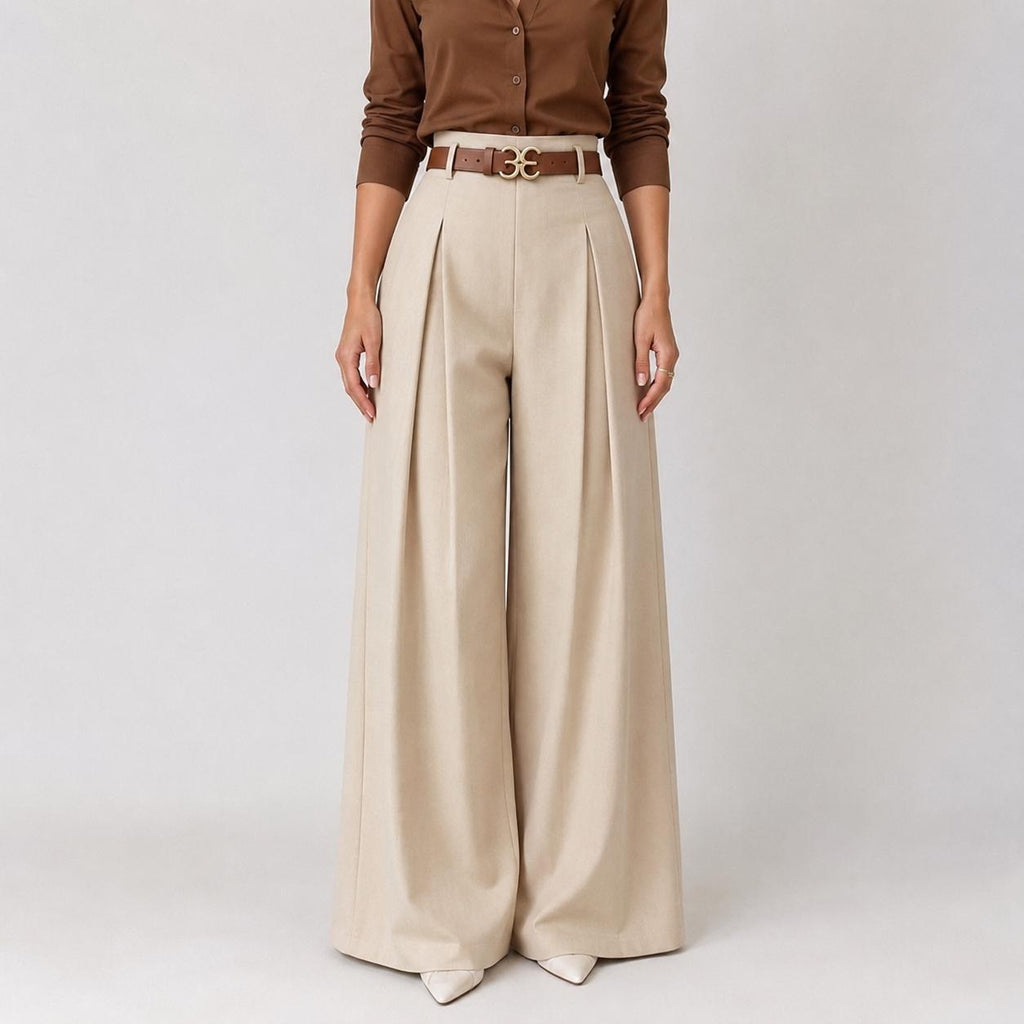 Pantalones de talle alto y pierna ancha con cintura elástica plisada.