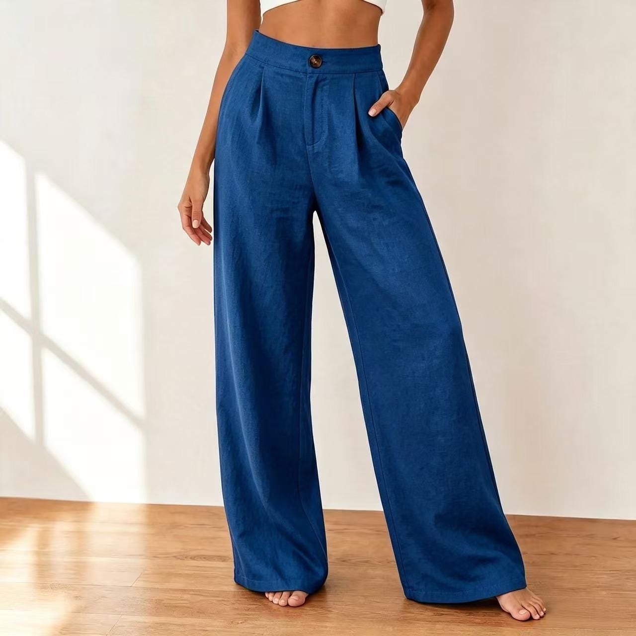 Pantalones plisados de pierna ancha