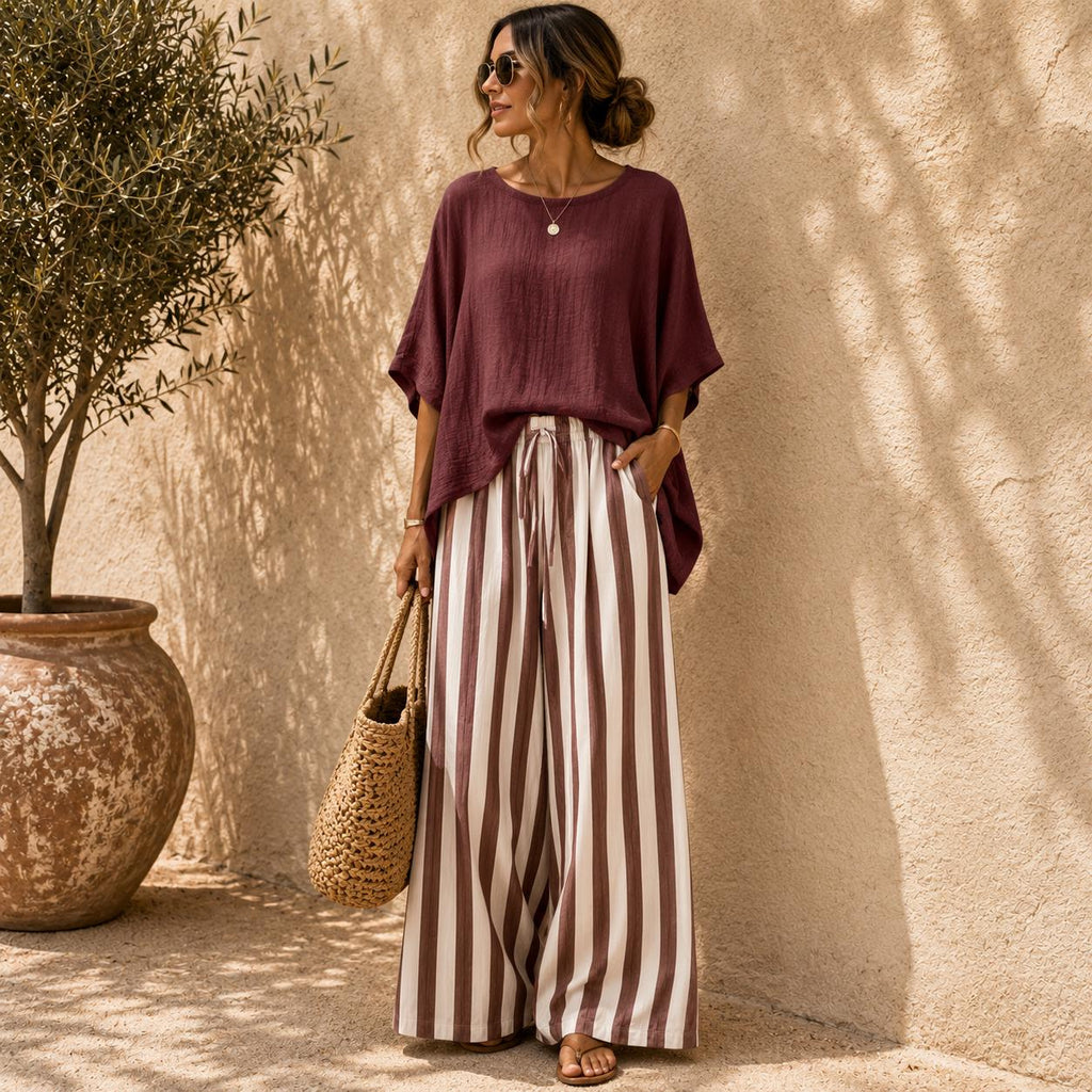 Conjunto de pantalón ancho a rayas y top de manga murciélago